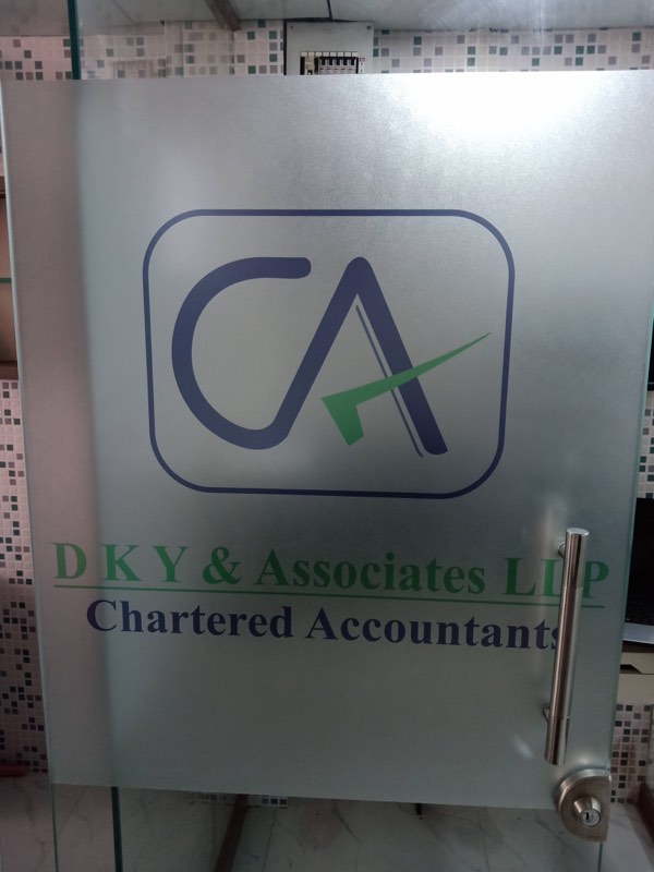 Frosted printed glass film with a firm's logo on an office door